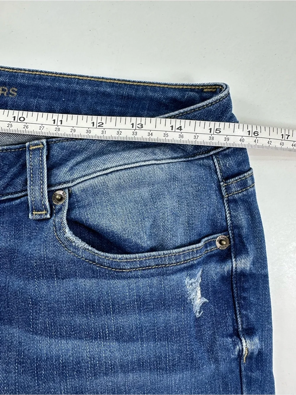 Michael Kors Women's Dark Blue Skinny Jeans with Subtle Distressing